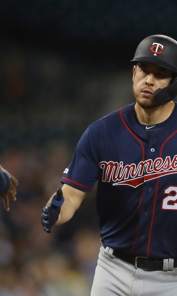 Twins break HR record but lose to Tigers 10-7